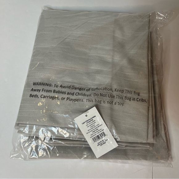 2pk (42” W x 84” L) Light Filtering Curtain Panel - Room Essentials ™ in Beige. - Picture 7 of 9